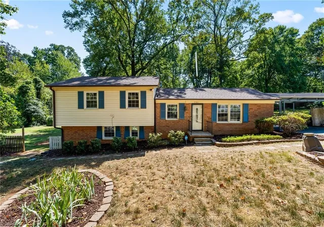 Photo 1 of Single family home for sale at 5701 Buddingwood Dr, Greensboro, NC 27409 | MLS# 1236363 | Listing updated on 2026-10-01