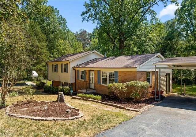 Photo 2 of Single family home for sale at 5701 Buddingwood Dr, Greensboro, NC 27409 | MLS# 1236363 | Listing updated on 2026-10-01
