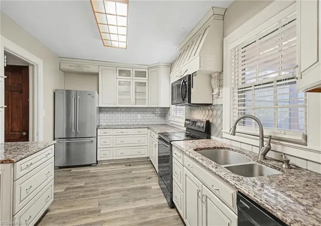 Photo 3 of Single family home for sale at 112 Erwin St, Mocksville, NC 27028 | MLS# 1234787 | Listing updated on 2026-09-17