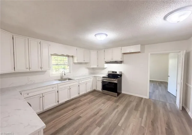 Photo 2 of Single family home for sale at 1715 Old Holw Rd, Walkertown, NC 27051 | MLS# 1237920 | Listing updated on 2026-10-28