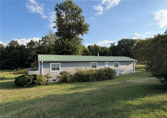Photo 1 of Manufactured home for sale at 297 Collins Rd, Dobson, NC 27017 | MLS# 1235391 | Listing updated on 2026-09-19