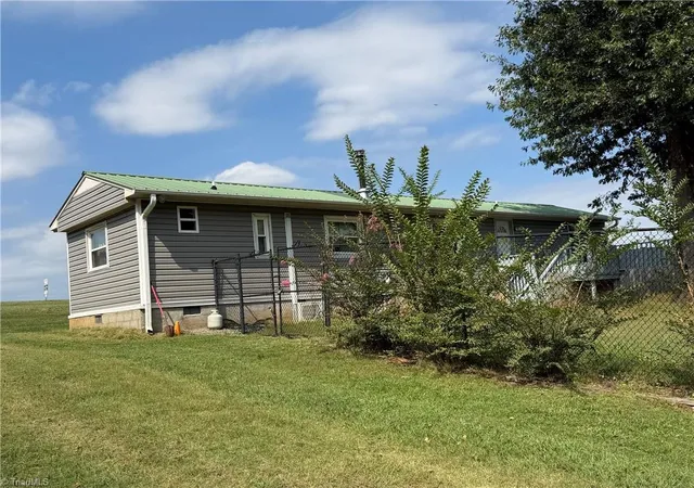 Photo 3 of Manufactured home for sale at 297 Collins Rd, Dobson, NC 27017 | MLS# 1235391 | Listing updated on 2026-09-19