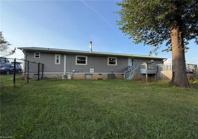Photo 3 of Manufactured home for sale at 297 Collins Rd, Dobson, NC 27017 | MLS# 1235391 | Listing updated on 2026-09-19