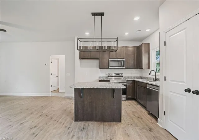 Photo 3 of Single family home for sale at 410 Fayetteville St, Liberty, NC 27298 | MLS# 1233826 | Listing updated on 2026-09-02