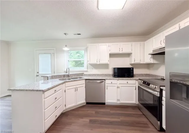 Photo 1 of Single family home for sale at 1001 Kingstree Ridge Dr, Winston Salem, NC 27127 | MLS# 1237206 | Listing updated on 2026-10-30
