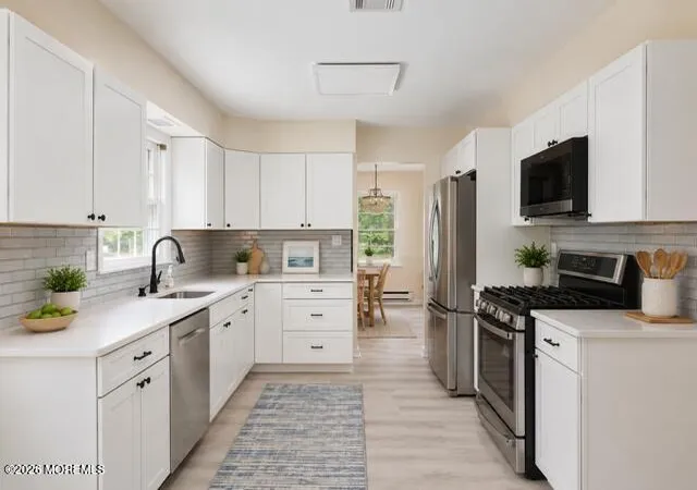 Photo 4 of Single family home for sale at 238 Lions Head Blvd S, Brick, NJ 08723 | MLS# 22628127 | Listing updated on 2026-09-11