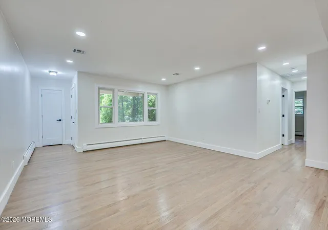 Photo 2 of Single family home for sale at 25 Woodbrook Dr, Matawan, NJ 07747 | MLS# 22630307 | Listing updated on 2026-09-25