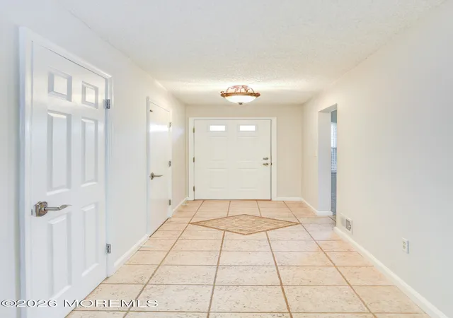 Photo 3 of Condo for sale at 76 Harbor Cir, Freehold, NJ 07728 | MLS# 22630323 | Listing updated on 2026-09-27