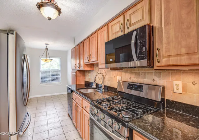 Photo 4 of Condo for sale at 76 Harbor Cir, Freehold, NJ 07728 | MLS# 22630323 | Listing updated on 2026-09-27