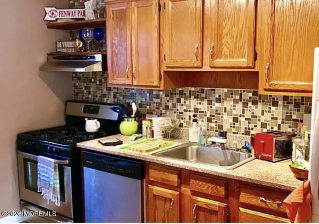 Listing Photo 1 - Condo for sale in building located at 100 N Manor Dr, Red Bank, NJ 07701 - Unit #100