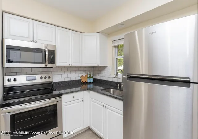 Listing Photo 1 - Condo for sale in building located at 321-323 Shore Dr, Highlands, NJ 07732 - Unit #21