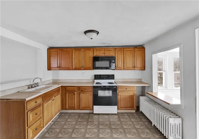 Photo 3 of Single family home for sale at 312 Lafferty St, Jeannette, PA 15644 | MLS# 1733118 | Listing updated on 2026-09-10