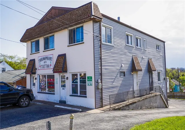 Photo 3 of Multi family home for sale at 1809 Pine Holw Rd, Kennedy Twp, PA 15136 | MLS# 1750797 | Listing updated on 2026-10-16