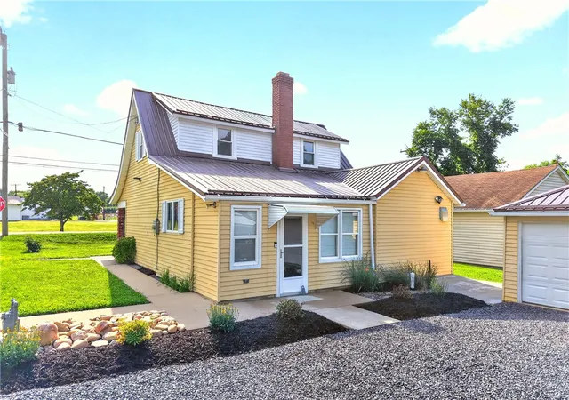 Photo 3 of Single family home for sale at 403 Perry Ave, Washington Twp, PA 15012 | MLS# 1764280 | Listing updated on 2026-09-08