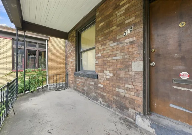 Photo 2 of Single family home for sale at 312 Johnston Ave, Hazelwood, PA 15207 | MLS# 1772543 | Listing updated on 2026-09-02