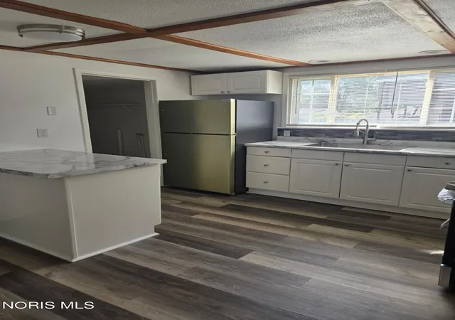 Photo 3 of Single family home for sale at 311 White St, Toledo, OH 43605 | MLS# 10013661 | Listing updated on 2026-09-25