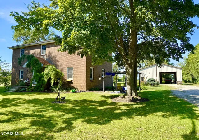 Photo 1 of Single family home for sale at 1031 N Cousino Rd, Oregon, OH 43616 | MLS# 10012829 | Listing updated on 2026-09-09