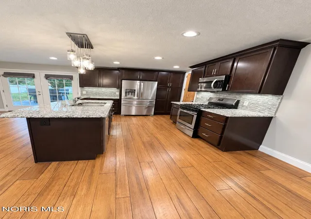 Photo 2 of Single family home for sale at 513 N Wintergarden Rd, Bowling Green, OH 43402 | MLS# 10015058 | Listing updated on 2026-10-28