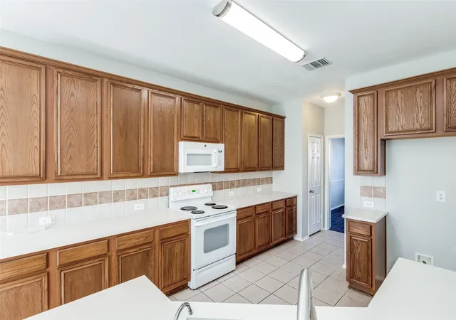 Photo 2 of Single family home for sale at 1018 Spanish Moss Dr, Garland, TX 75040 | MLS# 21144617 | Listing updated on 2026-10-20