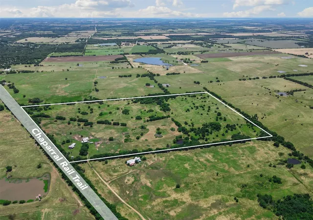 Photo 1 of Land for sale at 901 County Road 3925, Wolfe City, TX 75496 | MLS# 21200209 | Listing updated on 2026-09-11