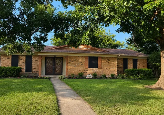 Photo 1 of Single family home for sale at 409 Colonial Dr, Garland, TX 75043 | MLS# 21207031 | Listing updated on 2026-07-30