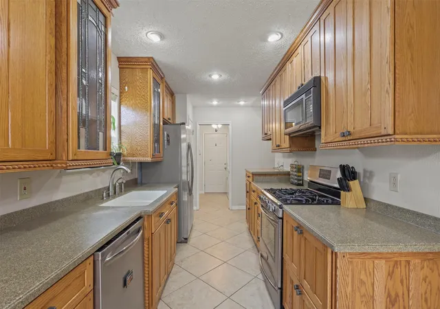 Photo 3 of Single family home for sale at 409 Colonial Dr, Garland, TX 75043 | MLS# 21207031 | Listing updated on 2026-07-30