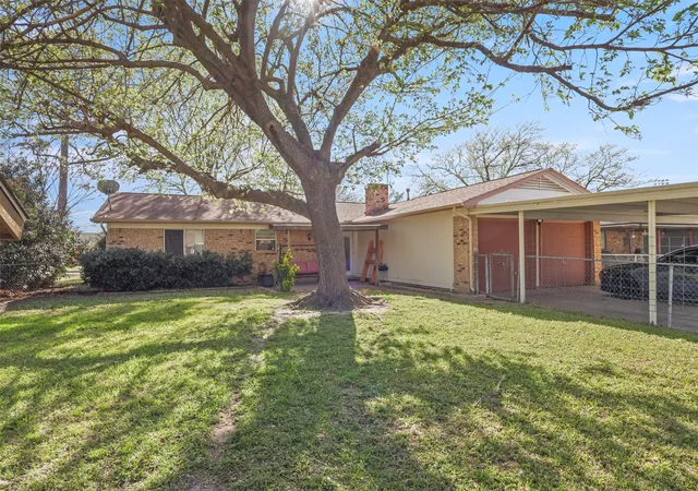 Photo 3 of Single family home for sale at 409 Colonial Dr, Garland, TX 75043 | MLS# 21207031 | Listing updated on 2026-07-30