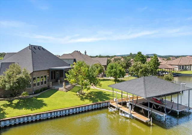 Photo 1 of Single family home for sale at 1203 Huntington Cove Ct, Granbury, TX 76048 | MLS# 21224756 | Listing updated on 2026-09-12