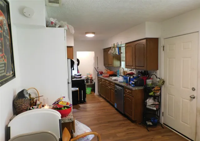 Photo 3 of Single family home for sale at 409 W Vista Dr, Garland, TX 75041 | MLS# 21223563 | Listing updated on 2026-09-08