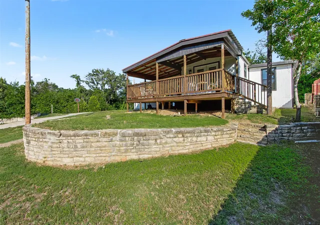 Photo 2 of Manufactured home for sale at 3819 Horseshoe Trl, Granbury, TX 76048 | MLS# 21229399 | Listing updated on 2026-09-30