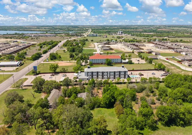 Photo 2 of Land for sale at 1724 W Henderson St, Cleburne, TX 76033 | MLS# 21231519 | Listing updated on 2026-10-02
