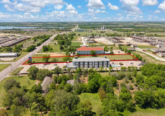 Photo 3 of Land for sale at 1724 W Henderson St, Cleburne, TX 76033 | MLS# 21231519 | Listing updated on 2026-10-02