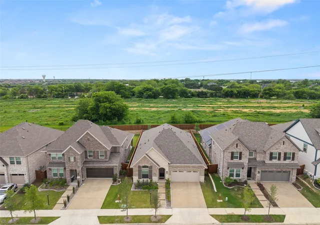 Photo 3 of Single family home for sale at 1000 Salvation Dr, Wylie, TX 75098 | MLS# 21240310 | Listing updated on 2026-09-12