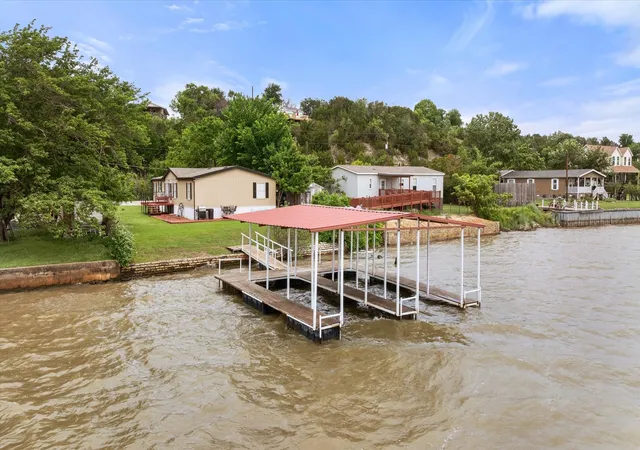 Photo 2 of Single family home for sale at 5821 Parkside Ct, Granbury, TX 76048 | MLS# 21249656 | Listing updated on 2026-09-12