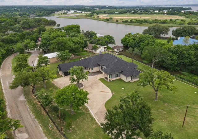 Photo 2 of Single family home for sale at 2100 Gene Ct, Granbury, TX 76048 | MLS# 21258342 | Listing updated on 2026-09-09