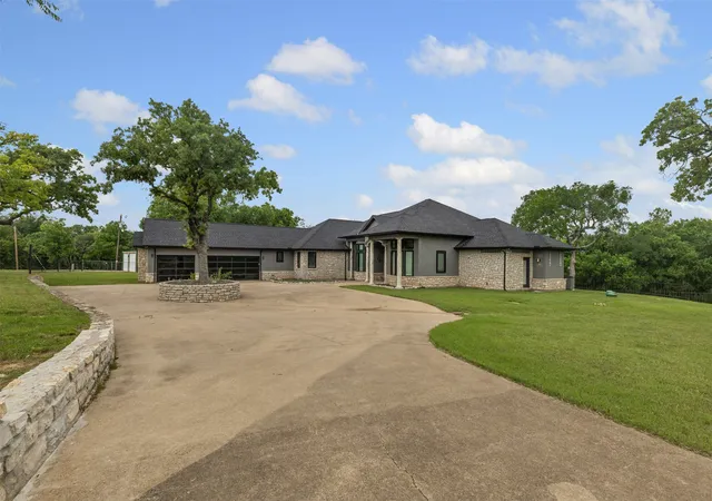 Photo 3 of Single family home for sale at 2100 Gene Ct, Granbury, TX 76048 | MLS# 21258342 | Listing updated on 2026-09-09