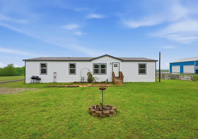 Photo 1 of Manufactured home for sale at 587 Kentucky Town Rd, Whitewright, TX 75491 | MLS# 21264095 | Listing updated on 2026-07-30