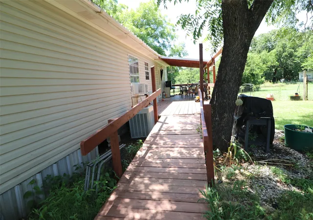 Photo 4 of Manufactured home for sale at 5209 Us Hwy 67, Stephenville, TX 76401 | MLS# 21258511 | Listing updated on 2026-09-09