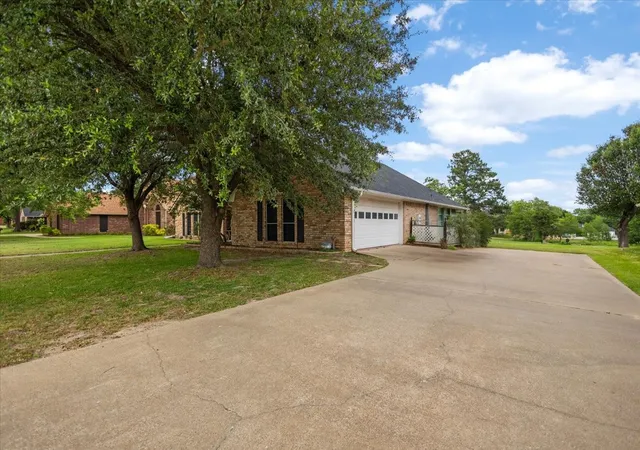 Photo 4 of Single family home for sale at 113 Saint Andrews Cir, Hideaway, TX 75771 | MLS# 21276958 | Listing updated on 2026-09-28