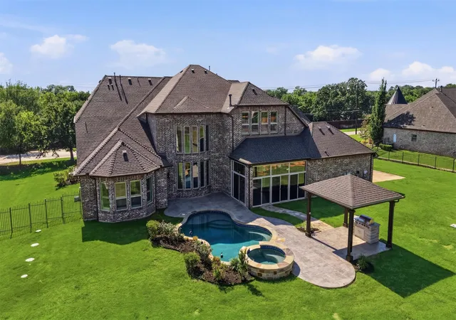Photo 3 of Single family home for sale at 715 Simmons Rd, Double Oak, TX 75077 | MLS# 21266364 | Listing updated on 2026-09-24
