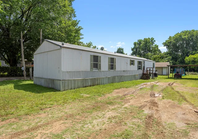 Photo 1 of Manufactured home for sale at 105 Syble Jean Dr, Burleson, TX 76028 | MLS# 21277517 | Listing updated on 2026-07-31