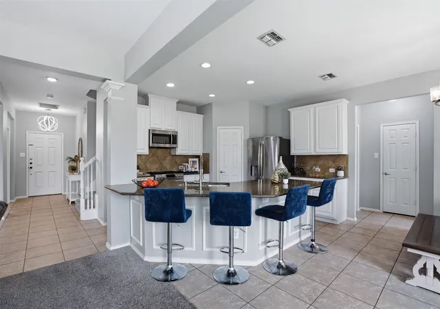 Photo 3 of Single family home for sale at 908 Lake Hollow Dr, Little Elm, TX 75068 | MLS# 21285421 | Listing updated on 2026-09-11