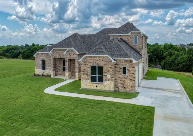 Photo 2 of Single family home for sale at 1097 Woodland Rd, Weatherford, TX 76088 | MLS# 21283732 | Listing updated on 2026-09-09