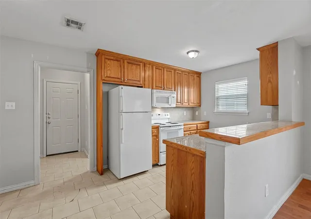 Photo 3 of House for sale at 408-410 Cleveland, Sherman, TX 75090 | MLS# 21292786 | Listing updated on 2026-09-24