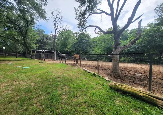 Photo 3 of Single family home for sale at 525 Estates Dr, Lewisville, TX 75077 | MLS# 21291134 | Listing updated on 2026-09-09