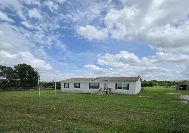 Photo 1 of Manufactured home for sale at 389 Hilltop Trl, Rhome, TX 76078 | MLS# 21295561 | Listing updated on 2026-09-14