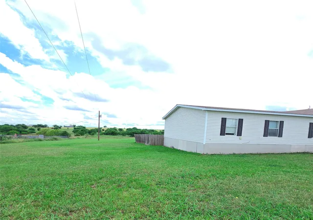 Photo 3 of Manufactured home for sale at 389 Hilltop Trl, Rhome, TX 76078 | MLS# 21295561 | Listing updated on 2026-09-14