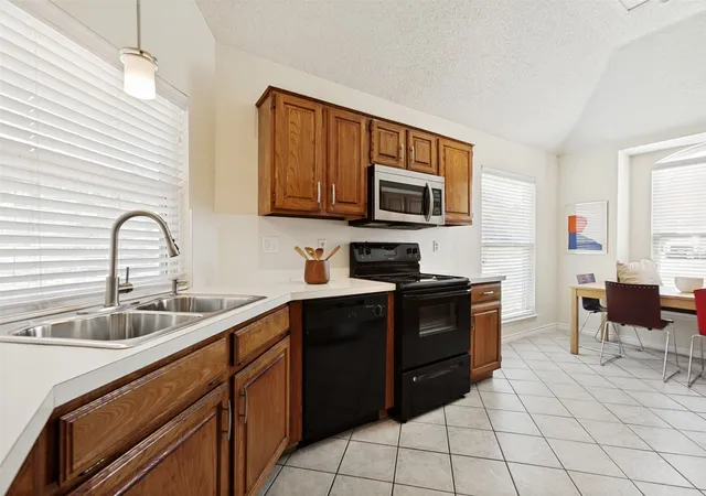 Photo 3 of Sale Pending at 2105 Glen Heights Dr, Garland, TX 75044 | MLS# 21298009 | Listing updated on 2026-09-11