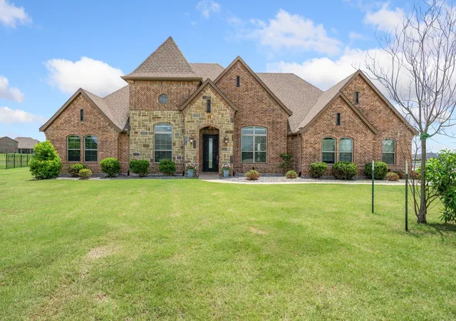Photo 2 of Single family home for sale at 2255 Lake Estates Dr, Rockwall, TX 75032 | MLS# 21291410 | Listing updated on 2026-10-07