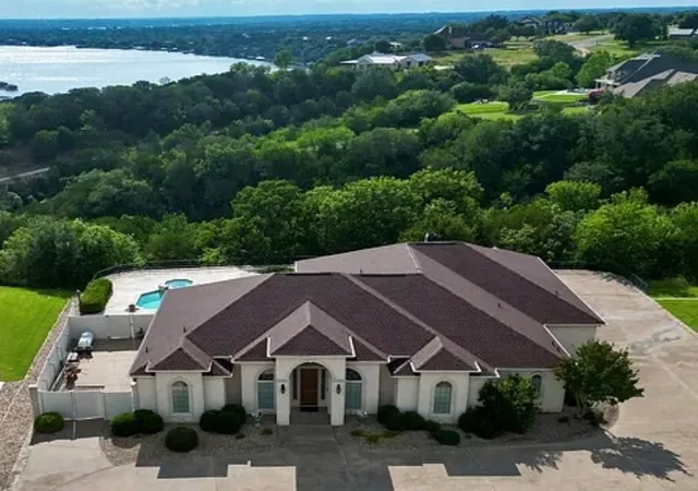 Photo 2 of Single family home for sale at 1614 Crow Creek Dr, Granbury, TX 76049 | MLS# 21300268 | Listing updated on 2026-09-29